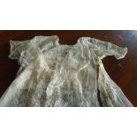 Attributed to Brussels, a lace three quarter length top, 135cm from collar to hem