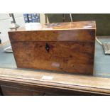 A Regency yew wood tea caddy