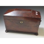 A Regency mahogany sarcophogus tea caddy