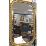 A gilt framed wall mirror with ribbon moulded border, 76cm x 46cm