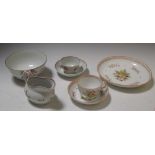 A New Hall 1045 pattern dish, tea cup and saucer, 594 pattern milk jug, tea cup and saucer and a 480