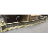 A 19th century brass fire kerb, 167cm wide