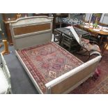 A French style grey painted double bed