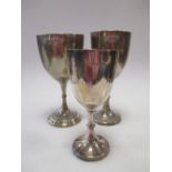 Three silver goblets