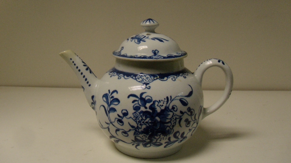 A Bow blue and white tea pot and cover (2)  The rims of both the cover and pot have restoration as