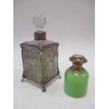 A silver mounted glass and a French green glass scent bottle