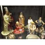 Seven 20th century Chinese pottery figures