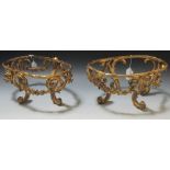 A pair of late 19th century of gilt bronze tureen stands