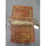 A Tekke and a flat weave bag, a flat weave tent band and a Belouchi bag panel (4)