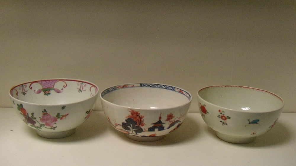 Three Lowestoft bowls, 15.5cm (6 in) diameter (3)  The coloured bowls each have a hair crack and the