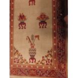 A Chinese sand ground wool runner decorated with urns and motifs to the main field, 353 x 93 cm