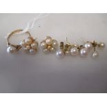 A 9ct gold pearl ring together with four pairs of pearl earrings (5)