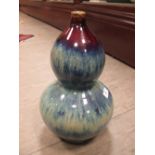 A Chinese flambe glazed double gourd vase, 34cm high