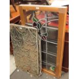 A pair of stained glass panels and five others similar