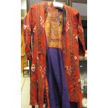 An Arabian embroidered purple robe and a jacket