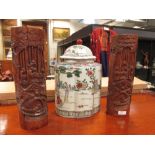 A pair of early 20th century carved Chinese bamboo vases and a modern porcelain jar and cover