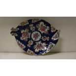 A Worcester blue scale dish, 26cm (10.25 in) wide  The handle is formed of two leaf stalks and one