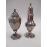 A George III silver caster and another European caster