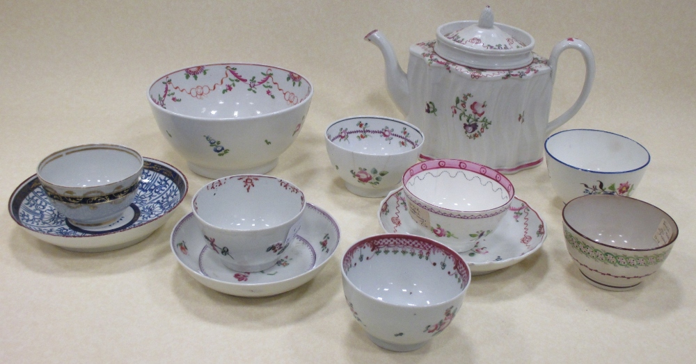 A New Hall 124 pattern tea pot together with tea bowls and saucers (12)