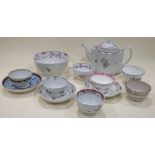 A New Hall 124 pattern tea pot together with tea bowls and saucers (12)