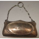 A silver evening bag