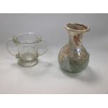 A Roman iridescent glass vase and an 18th century two handled glass vase