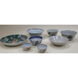 A collection of Chinese bowls, tea bowls and a plate