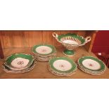 A mid 19th century English dessert service, possibly Ridgway, the green rims gilt