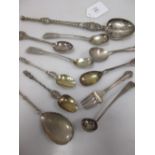Three George IV fiddle pattern mustard spoons, a salt spoon and various other silver and