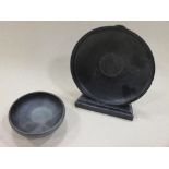 A Roman black pottery dish and a bowl