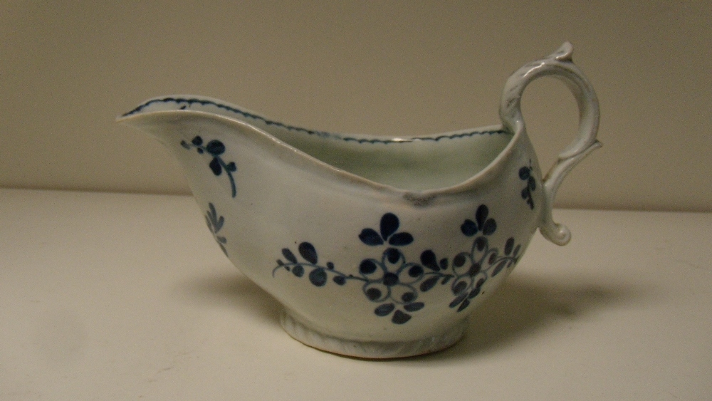 A Pennington's Liverpool blue and white sauce boat  There is a 1cm hair crack to the spout tip and - Image 2 of 4