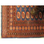 A blue ground Turkoman rug, 186 x 126cm