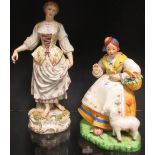 A late 19th century Meissen figure of a lady, together with another figure of a lady.