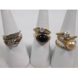 Six gemset rings and another ring, 17g gross, (7)