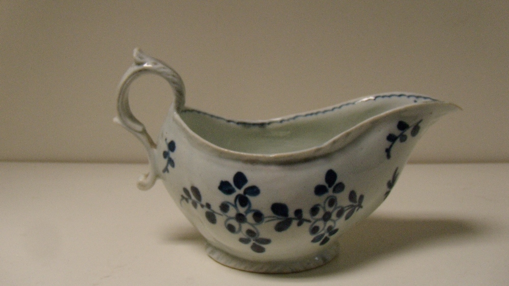 A Pennington's Liverpool blue and white sauce boat  There is a 1cm hair crack to the spout tip and - Image 3 of 4