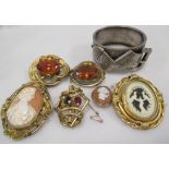 A quantity of late Victorian jewellery to consist of three gemset brooches, two cameo brooches,