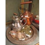 A copper kettle, horse brasses, electroplate tray, coffee pot and three coasters