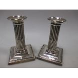 A pair of Mappin & Webb silver dwarf candlesticks