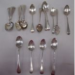 A collection of 21 silver tea spoons