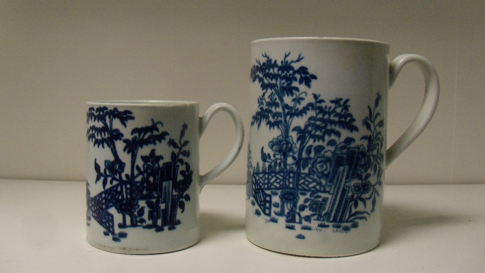 Two Worcester blue and white mugs, the pint and half pint sizes similarly printed, 12cm (4.75 in)