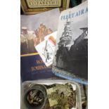 A quantity of WWII cap and other military badges, magazines etc