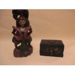 A Chinese black lacquer box together with a Burmese half bird and half man pillar carving