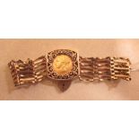 An 1871 sovereign set 9ct gold gate bracelet, 25g