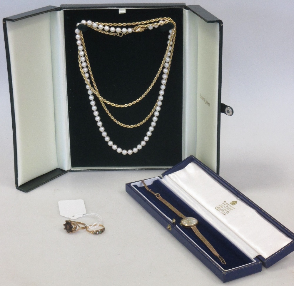 A 9ct rope chain (6.5g) together with a 9ct watch by Garrad (cased), a pearl necklace and two