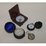 A compensated pocket compass by Ross, London, together with three compasses (4)