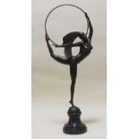 An Art Deco style bronze of a hoop dancer