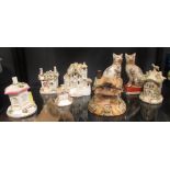 Six various cottage pastille burners and a pair of pottery cats (8)