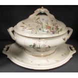 A Limoges service decorated with birds and foliage and collector's plates together with an