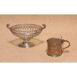 A silver sweetmeat basket and mustard pot