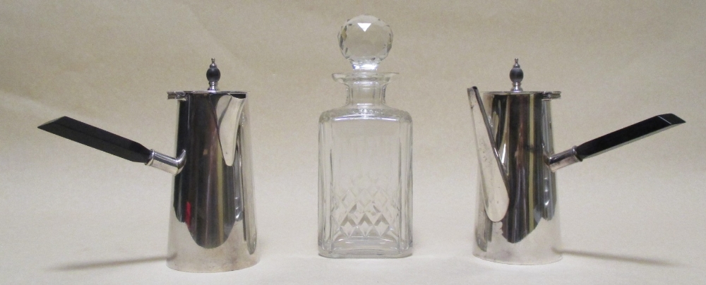 A pair of Art Deco silver plated side handled coffee pots and a cut glass decanter (3)